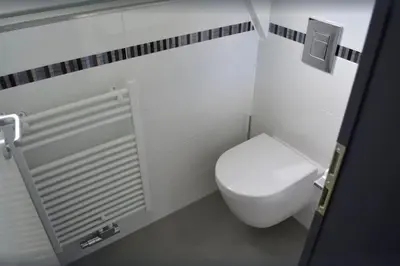 Ein Badezimmer in der Unterkunft Ferienhaus in Waldkatzenbach modern & renoviert