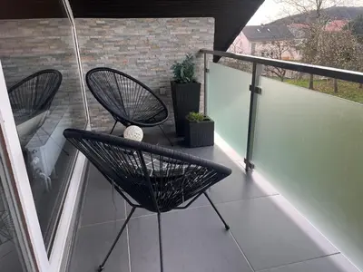 Ein Balkon oder eine Terrasse in der Unterkunft Ferienwohnung Kirschenlohr