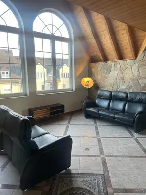 Ein Sitzbereich in der Unterkunft Luxuriöse Wohnung im Herzen von RLP