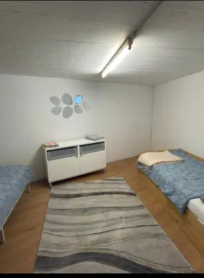 Ein Bett oder Betten in einem Zimmer der Unterkunft Pension Asel